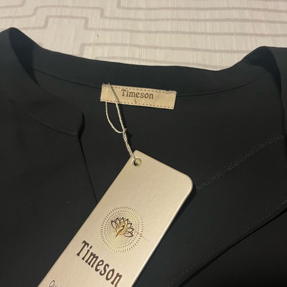 Timeson Black Ruffle-Trim Sleeveless Blouse - Picture 2 of 5